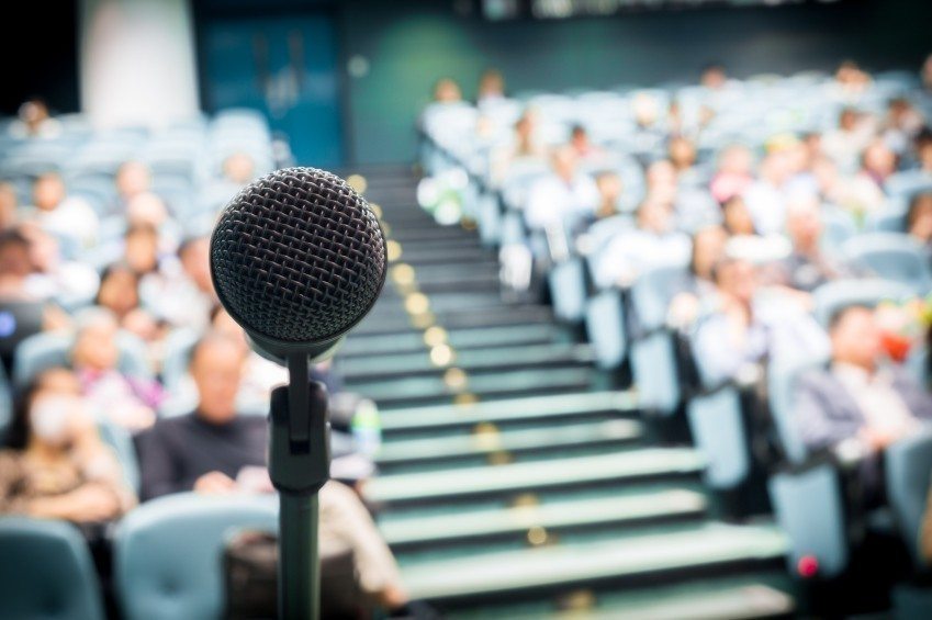Doctoral students and researchers at a conference